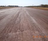Curing of EBS after surface seal of gravel airstrip