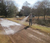 gravel road surface seal for dust suppression